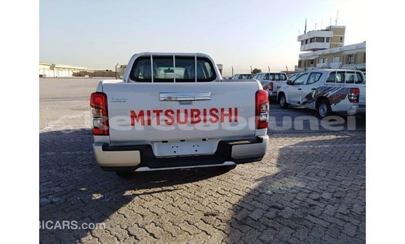 Buy Import Mitsubishi L200 White Car in Import - Dubai in Belait Buy Import Mitsubishi L200 White Car in Import - Dubai in Belait