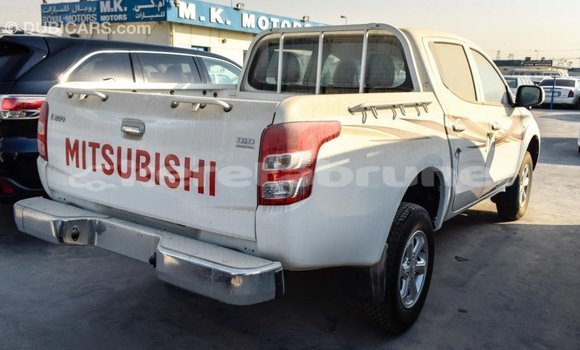 Buy Import Mitsubishi L200 White Car in Import - Dubai in Belait Buy Import Mitsubishi L200 White Car in Import - Dubai in Belait