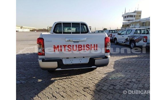 Buy Import Mitsubishi L200 White Car in Import - Dubai in Belait Buy Import Mitsubishi L200 White Car in Import - Dubai in Belait