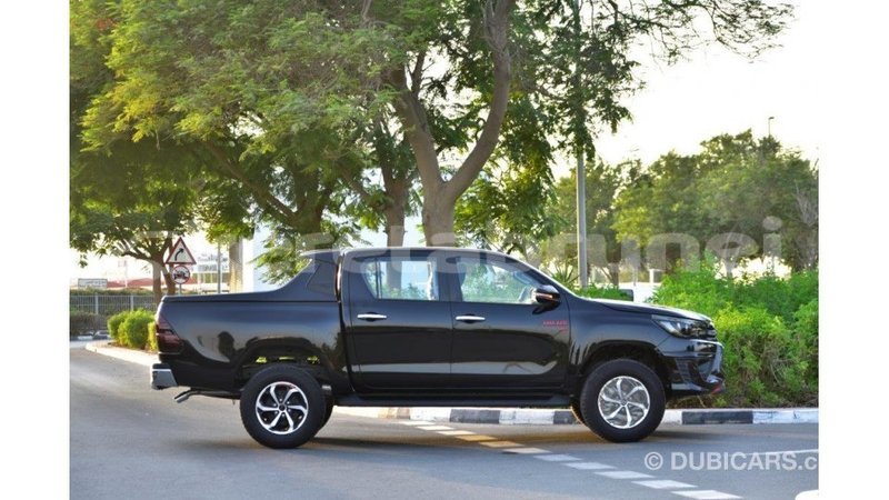 Big with watermark toyota hilux belait import dubai 2174
