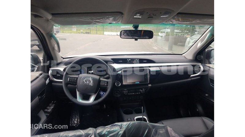 Big with watermark toyota hilux belait import dubai 2256