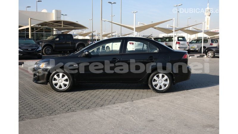 Big with watermark mitsubishi lancer belait import dubai 2392