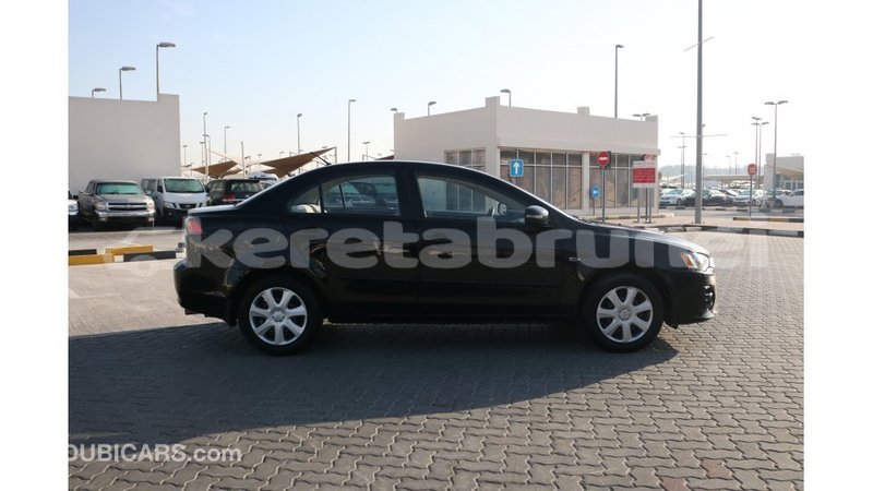 Big with watermark mitsubishi lancer belait import dubai 2392