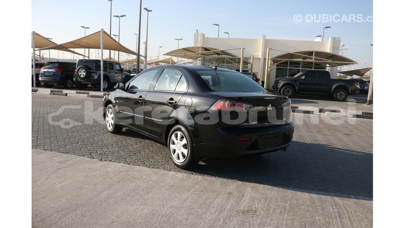 Big with watermark mitsubishi lancer belait import dubai 2392