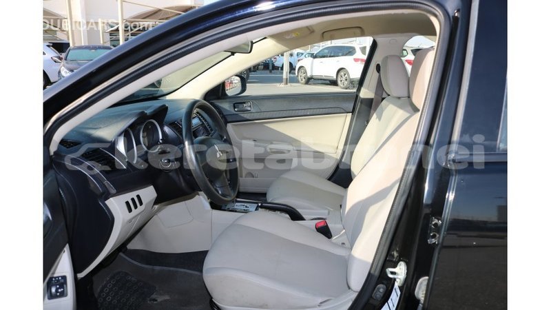 Big with watermark mitsubishi lancer belait import dubai 2392