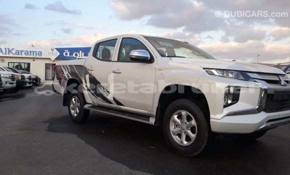Buy Import Mitsubishi L200 White Car in Import - Dubai in Belait Buy Import Mitsubishi L200 White Car in Import - Dubai in Belait