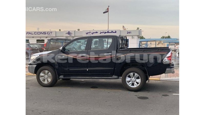 Big with watermark toyota hilux belait import dubai 2630