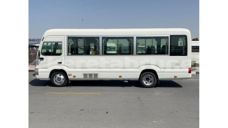 Big with watermark toyota coaster belait import dubai 3256