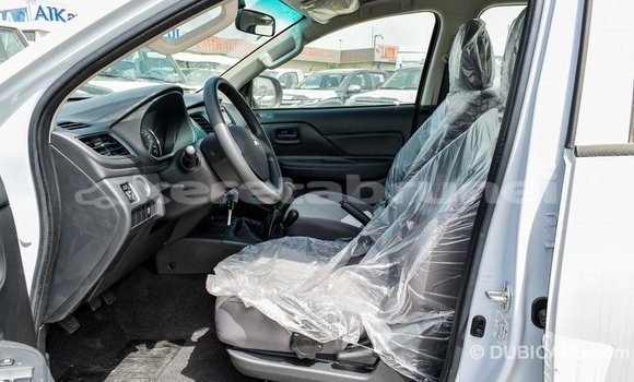 Buy Import Mitsubishi L200 White Car in Import - Dubai in Belait Buy Import Mitsubishi L200 White Car in Import - Dubai in Belait