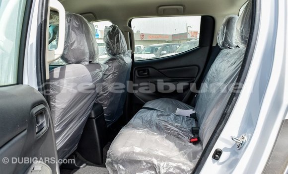 Buy Import Mitsubishi L200 White Car in Import - Dubai in Belait Buy Import Mitsubishi L200 White Car in Import - Dubai in Belait