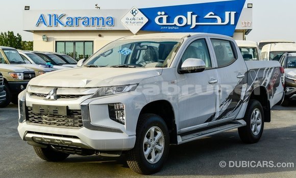 Buy Import Mitsubishi L200 White Car in Import - Dubai in Belait Buy Import Mitsubishi L200 White Car in Import - Dubai in Belait