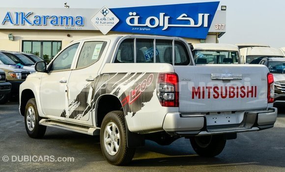 Buy Import Mitsubishi L200 White Car in Import - Dubai in Belait Buy Import Mitsubishi L200 White Car in Import - Dubai in Belait