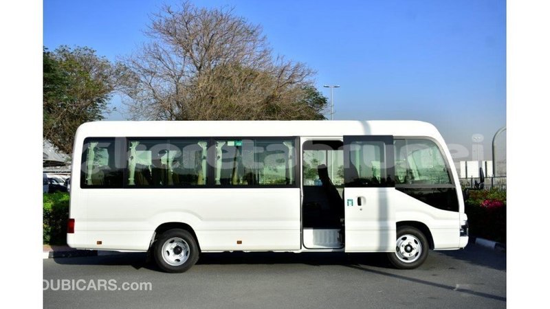 Big with watermark toyota coaster belait import dubai 3666
