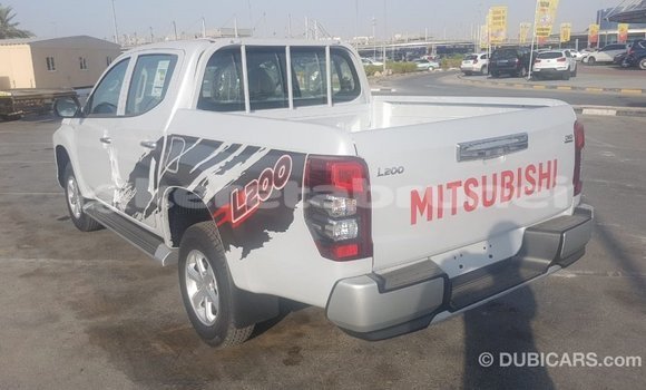Buy Import Mitsubishi L200 White Car in Import - Dubai in Belait Buy Import Mitsubishi L200 White Car in Import - Dubai in Belait