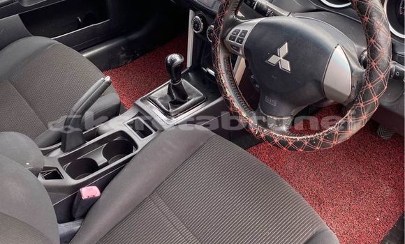 Buy Used Mitsubishi Lancer Red Car in Bandar Seri Begawan in Brunei-Muara Buy Used Mitsubishi Lancer Red Car in Bandar Seri Begawan in Brunei-Muara