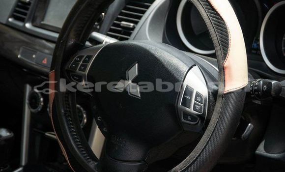 Buy Used Mitsubishi Lancer Red Car in Bandar Seri Begawan in Brunei-Muara Buy Used Mitsubishi Lancer Red Car in Bandar Seri Begawan in Brunei-Muara