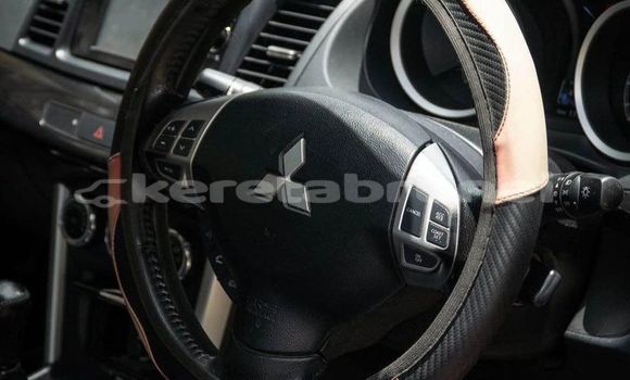 Buy Used Mitsubishi Lancer Red Car in Bandar Seri Begawan in Brunei-Muara Buy Used Mitsubishi Lancer Red Car in Bandar Seri Begawan in Brunei-Muara