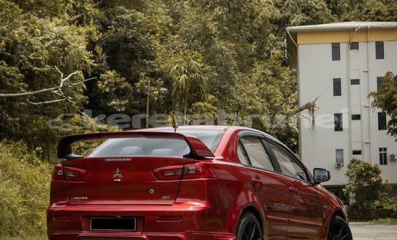 Buy Used Mitsubishi Lancer Red Car in Bandar Seri Begawan in Brunei-Muara Buy Used Mitsubishi Lancer Red Car in Bandar Seri Begawan in Brunei-Muara