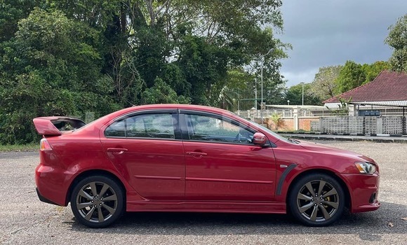 Buy Used Mitsubishi Lancer Red Car in Bandar Seri Begawan in Brunei-Muara Buy Used Mitsubishi Lancer Red Car in Bandar Seri Begawan in Brunei-Muara