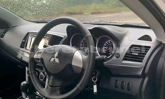 Buy Used Mitsubishi Lancer White Car in Tutong in Tutong Buy Used Mitsubishi Lancer White Car in Tutong in Tutong