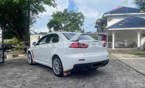 Buy Used Mitsubishi Lancer White Car in Bandar Seri Begawan in Brunei-Muara Buy Used Mitsubishi Lancer White Car in Bandar Seri Begawan in Brunei-Muara