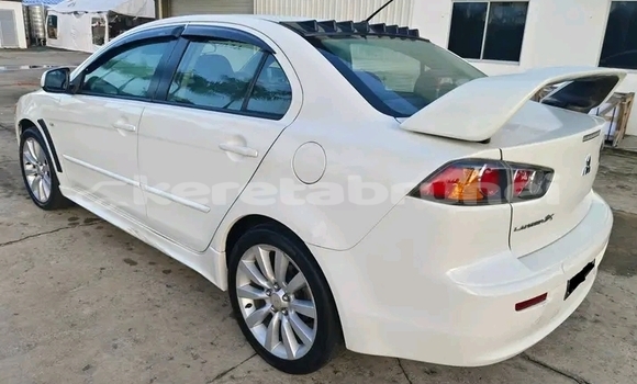 Buy Used Mitsubishi Lancer White Car in Kuala Belait in Belait Buy Used Mitsubishi Lancer White Car in Kuala Belait in Belait