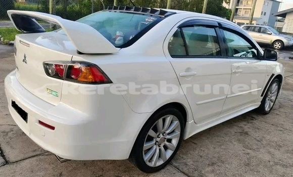 Buy Used Mitsubishi Lancer White Car in Kuala Belait in Belait Buy Used Mitsubishi Lancer White Car in Kuala Belait in Belait
