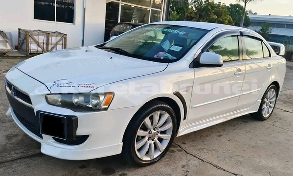 Buy Used Mitsubishi Lancer White Car in Kuala Belait in Belait Buy Used Mitsubishi Lancer White Car in Kuala Belait in Belait