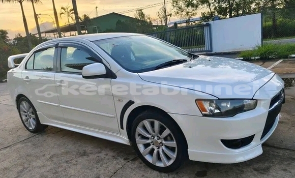 Buy Used Mitsubishi Lancer White Car in Kuala Belait in Belait Buy Used Mitsubishi Lancer White Car in Kuala Belait in Belait