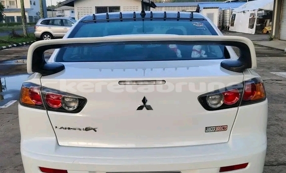 Buy Used Mitsubishi Lancer White Car in Kuala Belait in Belait Buy Used Mitsubishi Lancer White Car in Kuala Belait in Belait