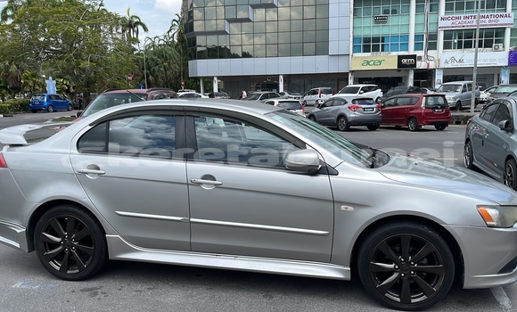 Buy Used Mitsubishi Lancer Silver Car in Seria in Belait